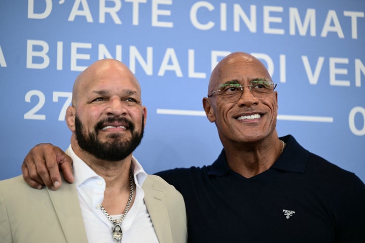 Former UFC fighter Mark Kerr poses with Dwayne Johnson at the 82nd International Venice Film Festival on Sep. 1.